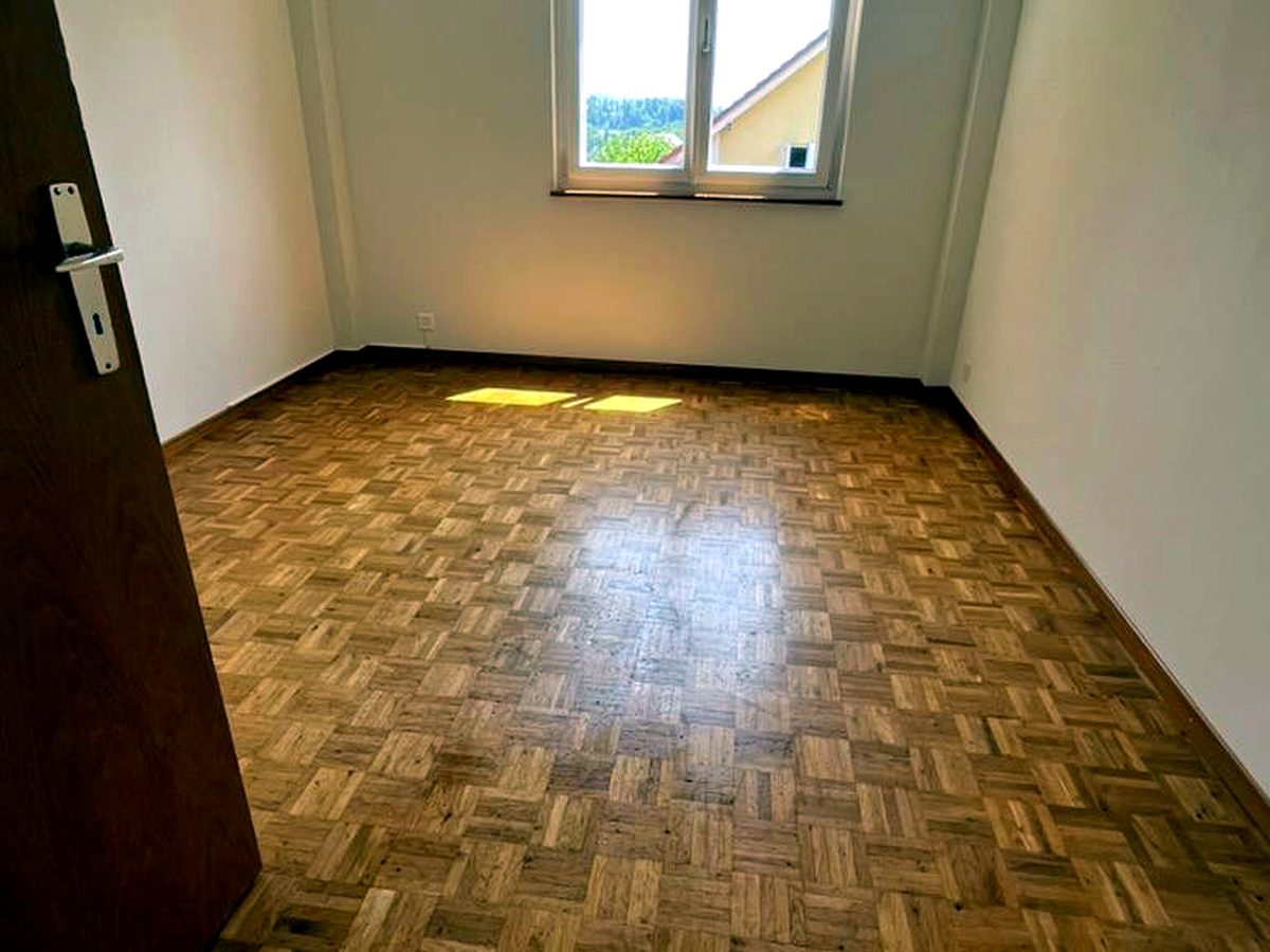 Fin de bail — chambre, parquet soigné